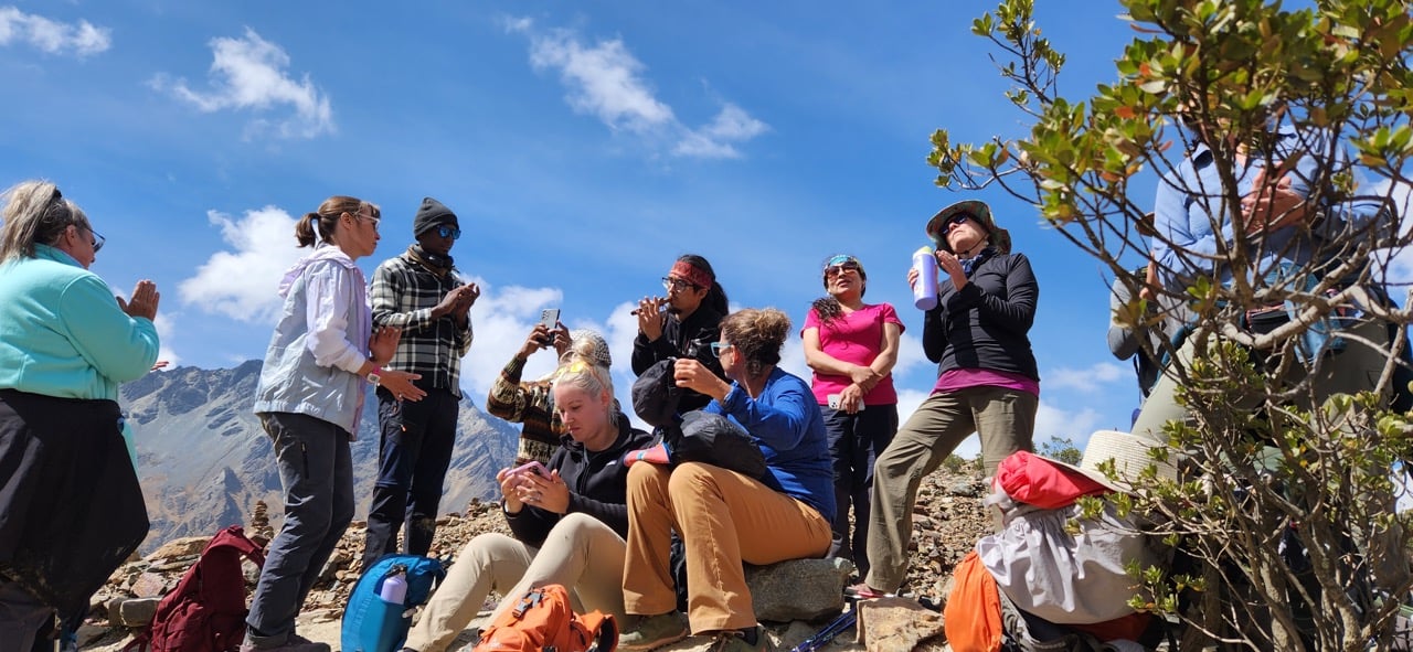 Group of women hiking in Peru during summer.