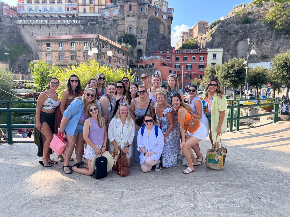 Group smiling in town on the Amalfi Coast in Southern Italy.