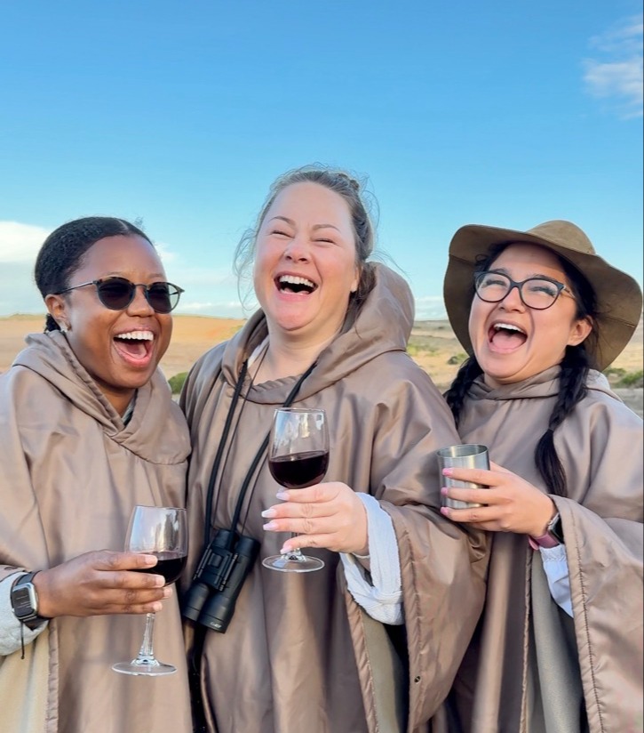 Friends drinking wine in South Africa.