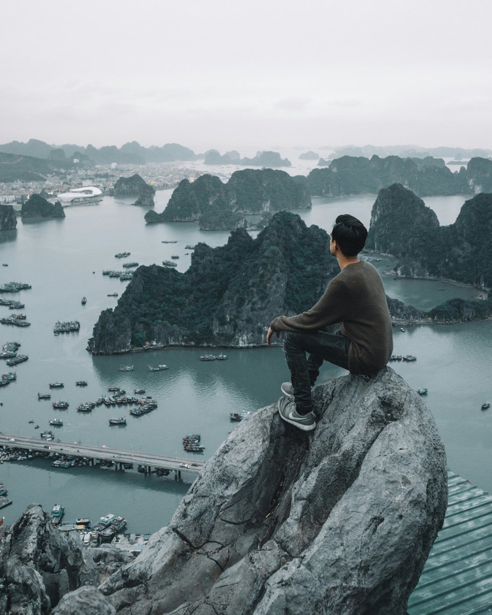 Traveler overlooking Vietnam bay.